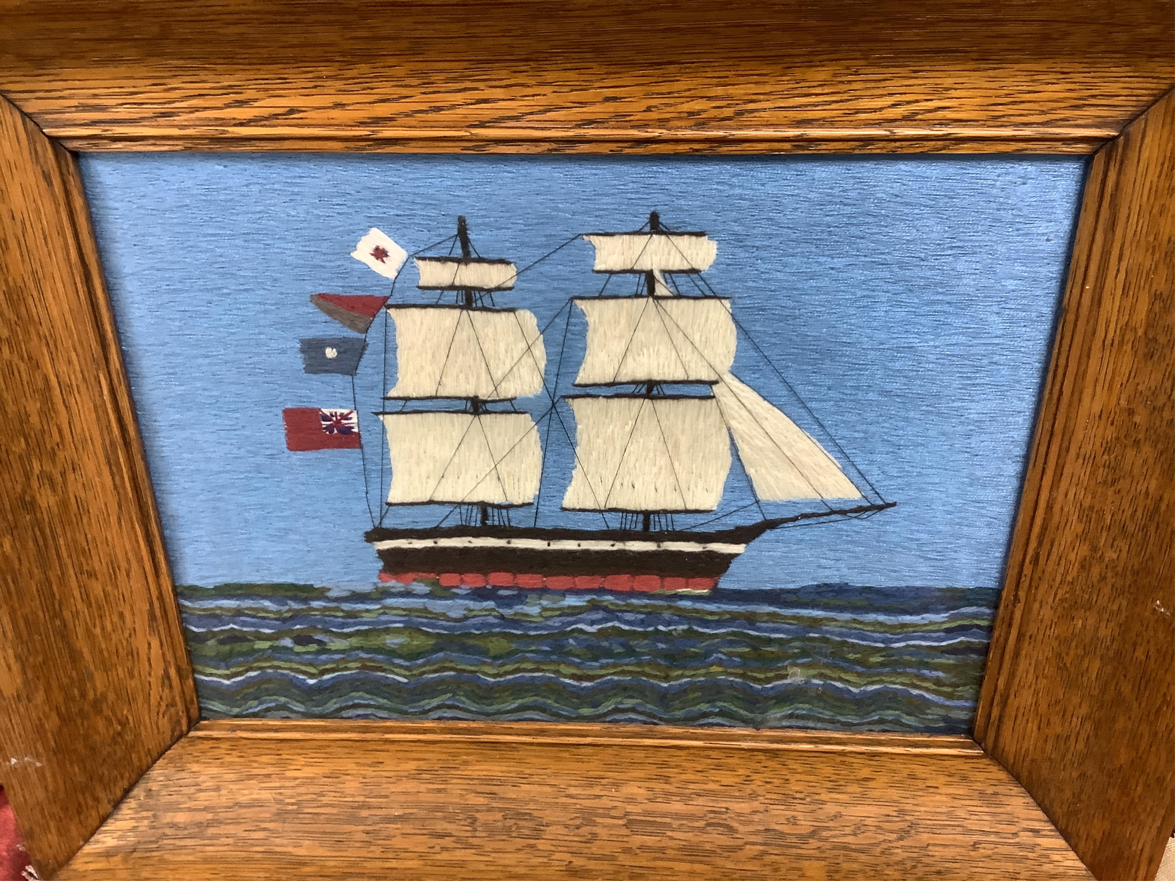 Three early 20th century Folk Art wool works of Clippers, two with flags, one embroidered Patricia, the third by a lighthouse, largest 31cm x 23cm. Condition - all three embroideries are unfaded or damaged, the frame on